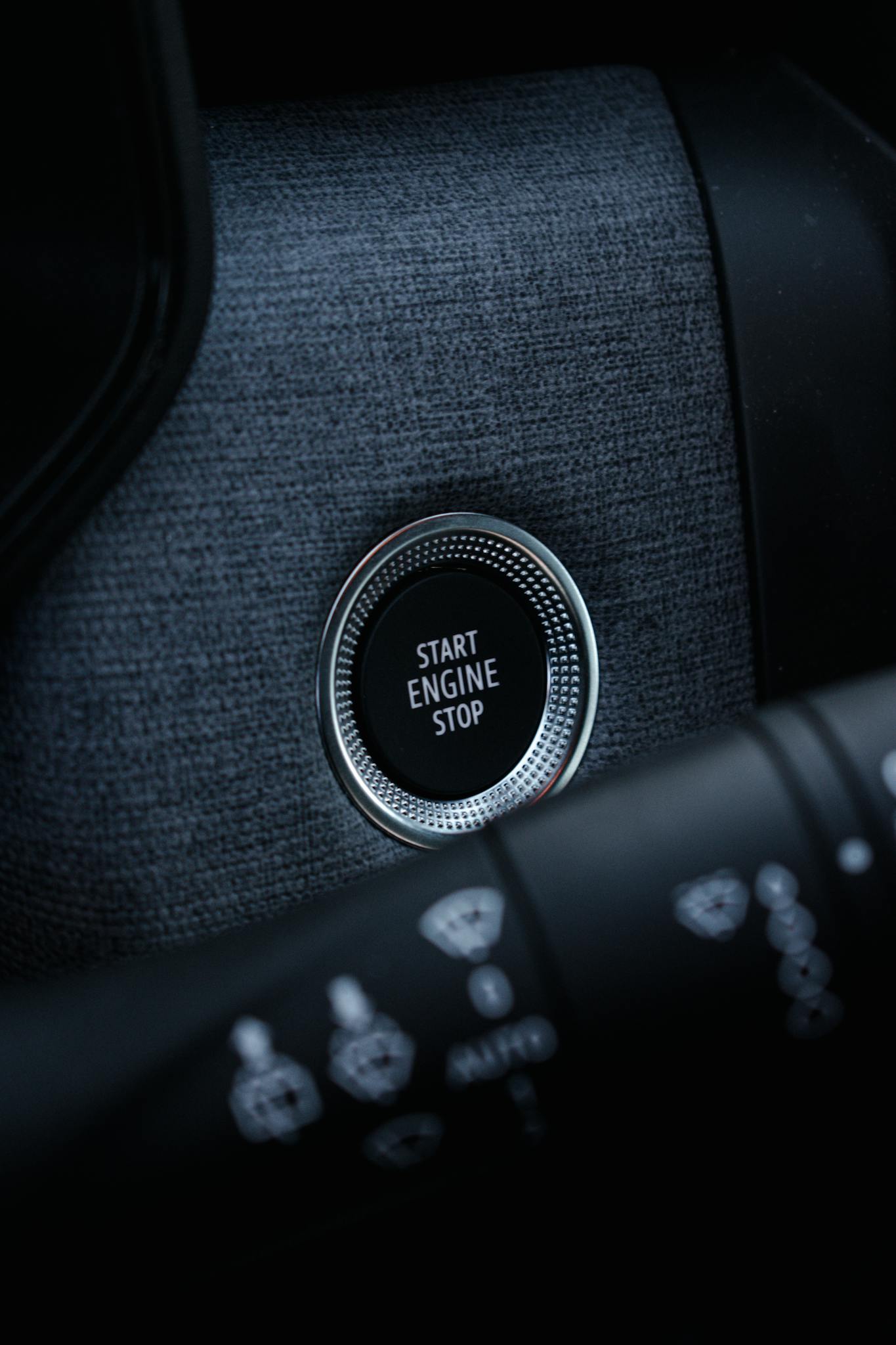 close up view of a cars start engine